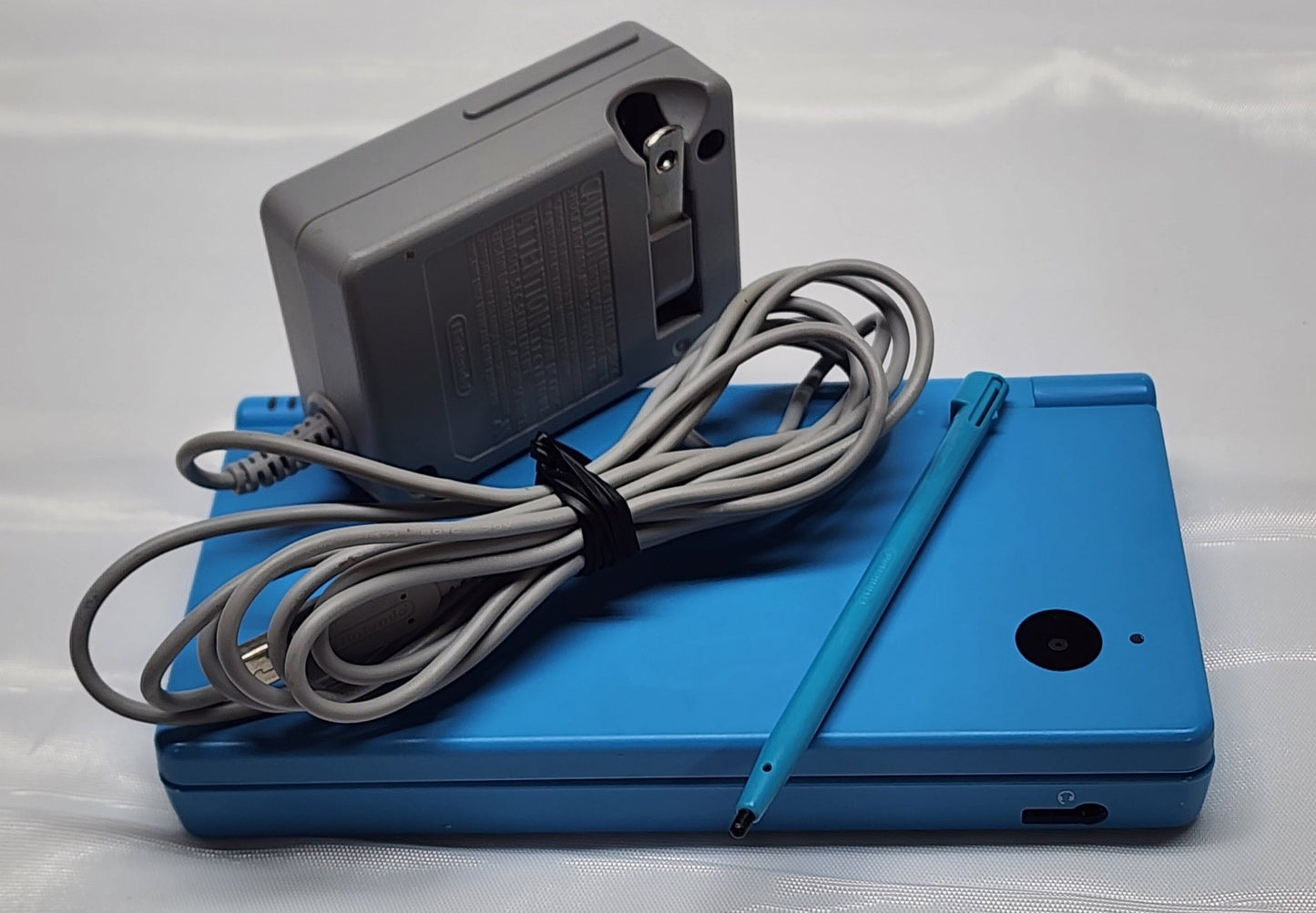 Blue DSi. Charger & Stylus Included. Works Great.